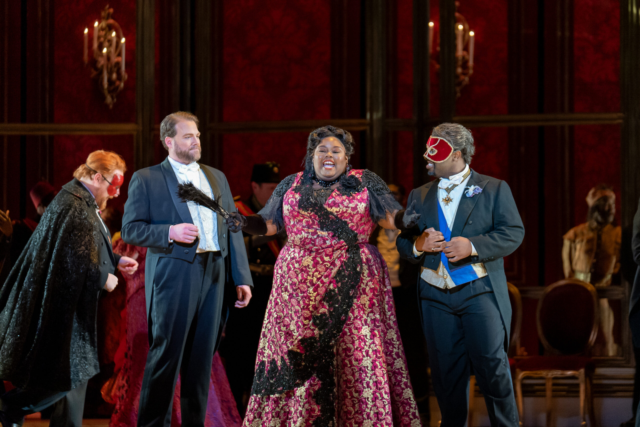 Performing in Detroit Opera’s La traviata (left to right): tenor River Guard (Gastone de Letorières), baritone Jonathan Lasch (Doctor Grenville), mezzosoprano Kendra Faith Beasley (Flora Bervoix), and baritone Cameron J. Rolling (Marquese d’Obigny) in a staging by Francesca Zambello, conducted by Roberto Kalb, October 19, 25, and 27 2024. Photo by Austin Richey / Detroit Opera