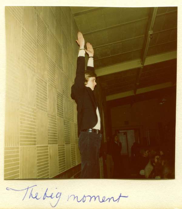 Steve Tennent conducts the orchestra from the back of Cranbrook Upper School’s Little Gym